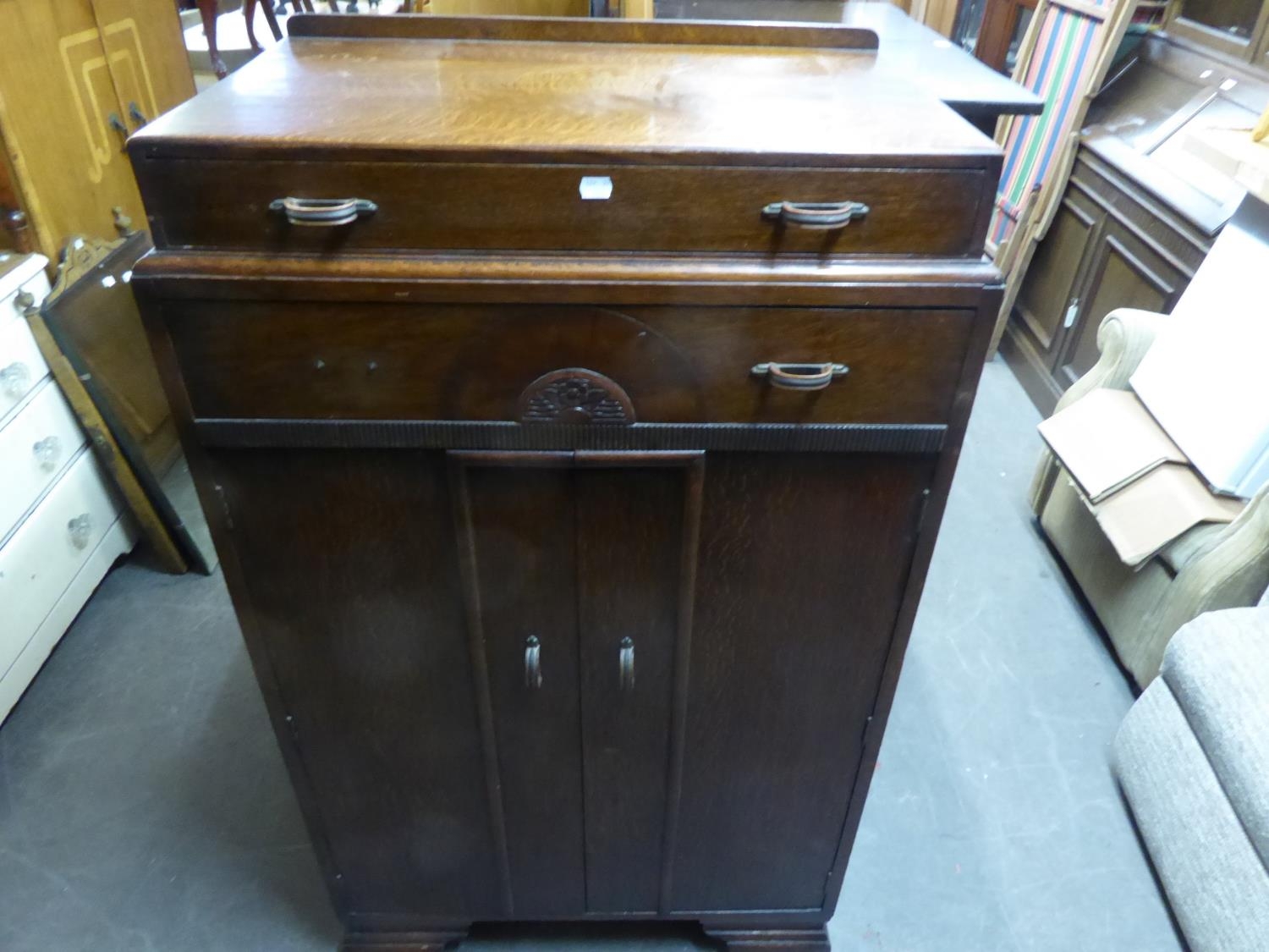 ART DECO OAK CARVED AND INLAID BEDROOM SUITE OF THREE PIECES, VIZ TWO DOOR HANG WARDROBE, DOUBLE