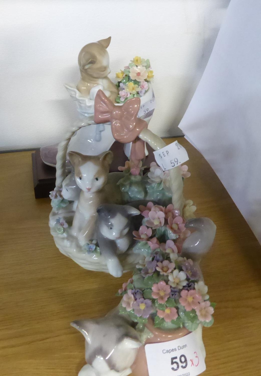 THREE LLADRO PORCELAIN GROUPS OR MODELS OF CATS, comprising: ‘PURR-FECT’, modelled as a basket