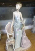 LLADRO ‘LADY OF TASTE’ PORCELAIN FIGURE, modelled as an elegant lady carrying flowers and standing