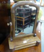 VICTORIAN MAHOGANY SWING TOILET MIRROR, MILESTONE SHAPED ON AN OBLONG PLATFORM BASE WITH A SINGLE