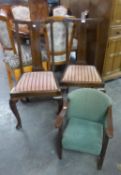 A PAIR OF MAHOGANY DINING CHAIRS AND A SMALL OAK CHILD'S ARMCHAIR (3)
