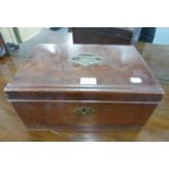 NINETEENTH CENTURY MAHOGANY BOX, with brass handle to the hinged top and green baize lined interior,