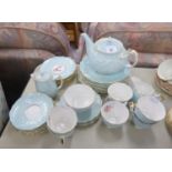 AYNSLEY CHINA TEA SET FOR SIX PERSONS, PALE BLUE AND GILT WITH PRINTED DECORATION OF PINK ROSES,