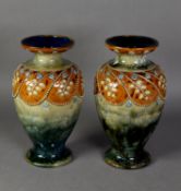 PAIR OF ROYAL DOULTON (LAMBETH) STONEWARE VASES, of shouldered oviform, the mottled olive green