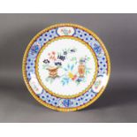 CIRCA 1900 MINTONS POTTERY WALL PLAQUE, colourfully printed and enamelled in chinoiserie taste, blue