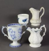 FOUR PIECES OF NINETEENTH CENTURY AND LATER CERAMICS, comprising: FLORAL MOULDED POTTERY JUG, of