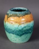 WILLIAM HOWSON TAYLOR, RUSKIN POTTERY OVOID VASE, covered with a mottled crystalline turquoise green