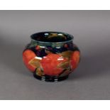 INTER-WAR YEARS WILLIAM MOORCROFT POTTERY SQUAT FORM VASE OR JARDINIERE, decorated to the exterior