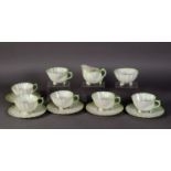 SET OF SIX BELLEEK PRE-WAR 'GREEN NEPTUNE' PATTERN TEA CUPS AND FIVE MATCHING SAUCERS, shell