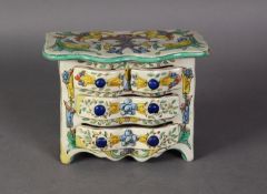 CONTINENTAL MAIOLICA POTTERY MINIATURE CHEST OF DRAWERS, with shaped front and two short and wo long