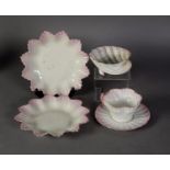 PAIR OF BELLEEK EARLY TWENTIETH CENTURY PINK EDGE FLOWER HEAD PATTERN SMALL DISHES, fluted pointed