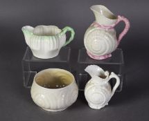 EARLY TWENTIETH CENTURY BELLEEK SHELL MOULDED SMALL JUG, with pink rustic handle, collar and base,