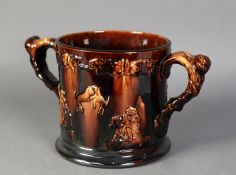 IMPRESSIVE NINETEENTH CENTURY TREACLE GLAZED AND MOULDED POTTERY LARGE TWO HANDLED DOUBLE FROG