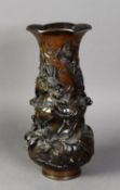 LATE 19th CENTURY CHINESE BRONZE DOUBLE GOURD FORM VASE, entwined in alto relief with a three-toed