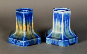 WILLIAM HOWSON TAYLOR, RUSKIN POTTERY MATCHED PAIR of DWARF CANDLESTICKS, each covered with a