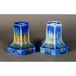 WILLIAM HOWSON TAYLOR, RUSKIN POTTERY MATCHED PAIR of DWARF CANDLESTICKS, each covered with a