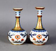 MATCHED PAIR OF JAMES MACINTYRE POTTERY VASES, decorated in underglaze blue with overglaze iron