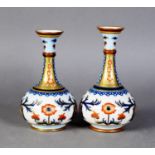 MATCHED PAIR OF JAMES MACINTYRE POTTERY VASES, decorated in underglaze blue with overglaze iron