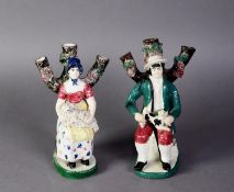 PAIR OF NINETEENTH CENTURY SCOTTISH FIGURAL POTTERY SPILL VASE FIGURES, each painted in colours