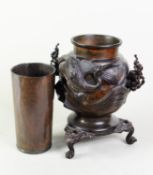 ORIENTAL LATE 19th/EARLY 20th CENTURY TWO HANDLE OVOID BRONZE VASE with alto relief design of a