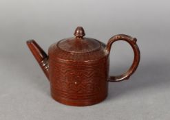 EIGHTEENTH CENTURY STAFFORDSHIRE REDWARE MOULDED POTTERY SMALL TEAPOT AND COVER, of cylindrical form