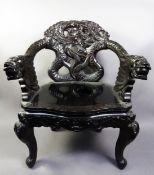 VERY SIMILAR TUB CHAIR, the dragons with inlaid eyes