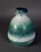 WILLIAM HOWSON TAYLOR, RUSKIN POTTERY VASE, covered with a crystalline off-white and mottled