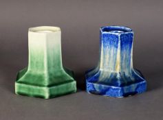 WILLIAM HOWSON TAYLOR, RUSKIN POTTERY TWO IDENTICALLY FORMED DWARF CANDLESTICKS, one covered with