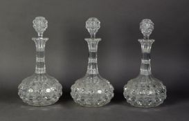 SET OF THREE CUT GLASS GLOBE AND SHAFT DECANTERS AND STOPPERS, 12” (30.5cm) high, (3) C/R- usual