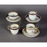 THREE LATE EIGHTEENTH/ EARLY NINETEENTH CENTURY DERBY PORCELAIN COFFEE CUPS AND SAUCERS IN BLUE