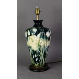 WALTER MOORCROFT NIVALIS PATTERN TUBE LINED POTTERY TABLE LAMP BASE, of high shouldered form with