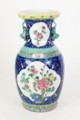 20th CENTURY CHINESE PORCELAIN VASE of ovular form with Buddhistic lion handles, all-over