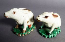 PAIR OF CIRCA 1800 ENGLISH TIN GLAZED EARTHENWARE RABBITS, the ears, eyes, mouths and feet picked