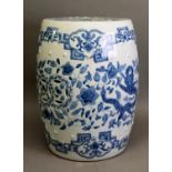 TWENTIETH CENTURY CHINESE BLUE AND WHITE POTTERY BARREL SHAPED GARDEN SEAT, outlined and washed with