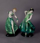 TWO MODERN CONTINENTAL CHINA ART DECO STYLE FEMALE FIGURES, each modelled in a green dress and