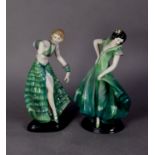 TWO MODERN CONTINENTAL CHINA ART DECO STYLE FEMALE FIGURES, each modelled in a green dress and