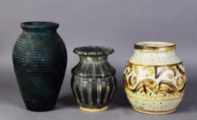 THREE STUDIO POTTERY VASES, comprising: ONE with waisted neck in mottled blue glaze, 6 ¼” (15.9cm)