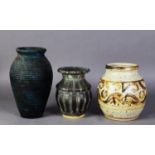 THREE STUDIO POTTERY VASES, comprising: ONE with waisted neck in mottled blue glaze, 6 ¼” (15.9cm)