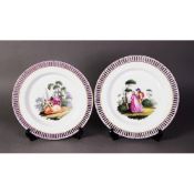 PAIR OF NINETEENTH CENTURY HAND PAINTED BERLIN PORCELAIN CABINET OR RIBBON PLATES, each of typical