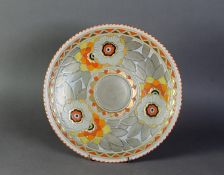 CHARLOTTE RHEAD SIGNED CIRCULAR PLAQUE, floral and foliage tube lined design in orange, yellow, gilt