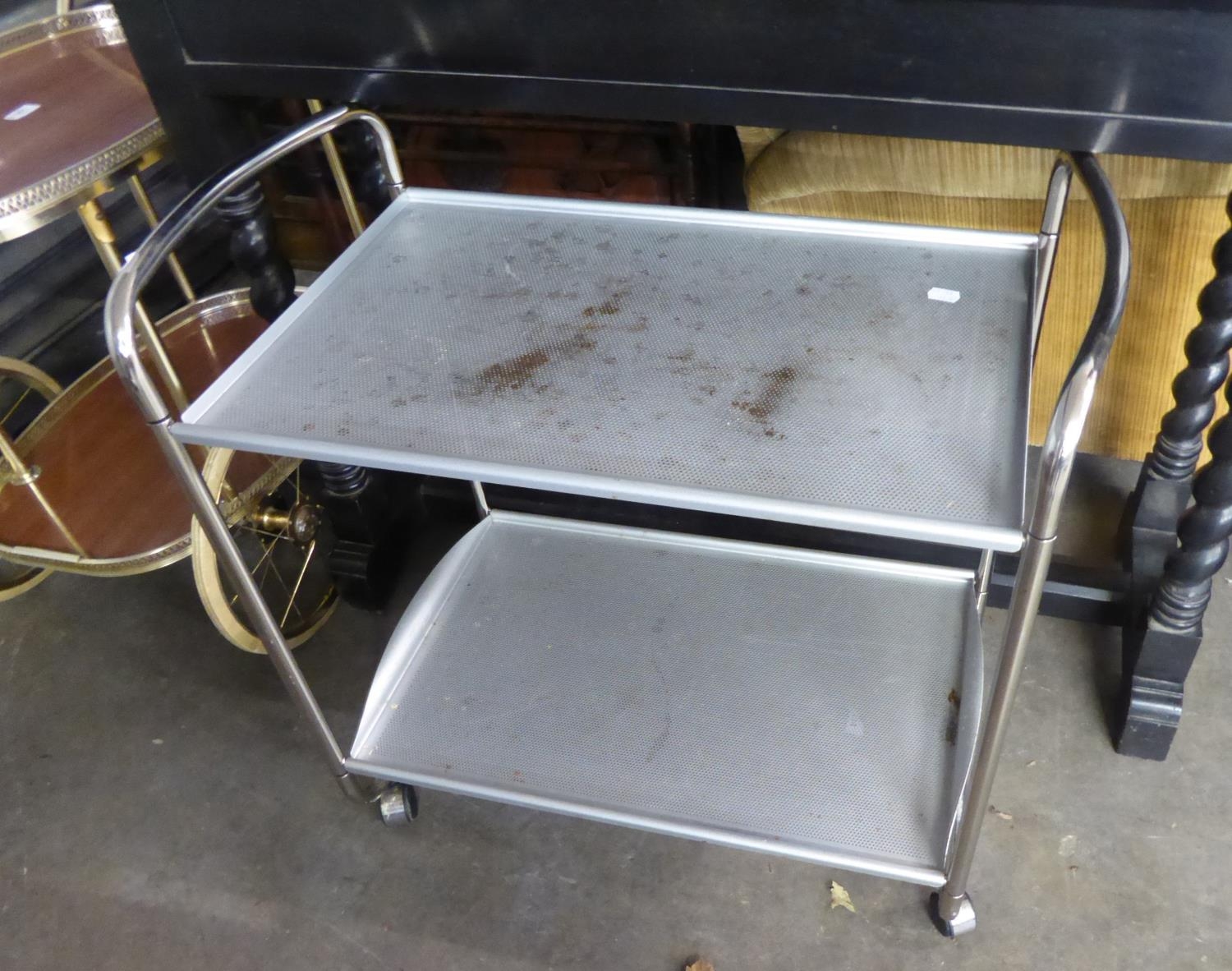 A GILT METAL TWO TIER COCKTAIL TROLLEY, WITH LARGE AND SMALL WHEELS, WOOD EFFECT FORMICA TOPPED - Image 2 of 2