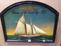 A REPLICA PAINTED WOOD RELIEF WALL PANEL ‘AMERICA, WINNER OF THE QUEEN CUP 1852’