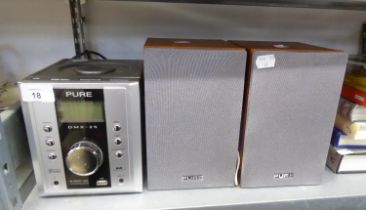 A PURE DMX-25 DAB RADIO/CD PLAYER WITH A PAIR OF SPEAKERS