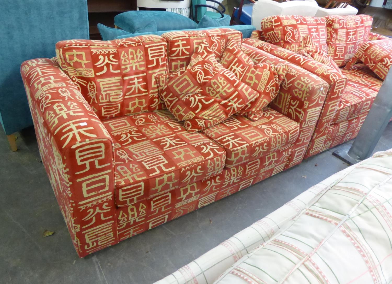 A LOUNGE SUITE OF 3 PIECES, COVERED IN RED FABRIC, EMBOSSED WITH WHITE ORIENTAL CHARACTERS, VIZ, A - Image 2 of 2