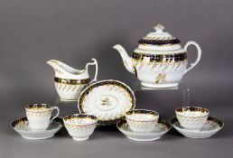 THREE WORCESTER LATE EIGHTEENTH CENTURY FLUTED TEA BOWL AND SAUCERS, blue and gilt border of oval