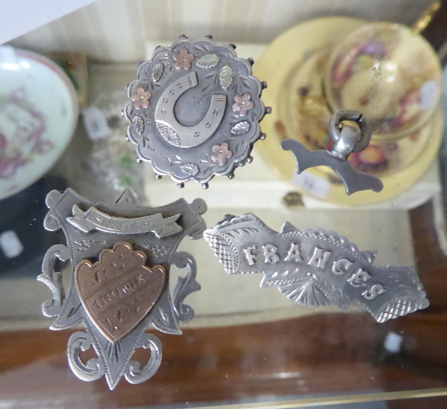 1894 SILVER AND GILT OVERLAID PRIZE SHIELD MEDALLION AND TWO SILVER BROOCHES, ONE LETTERED 'FRANCES'