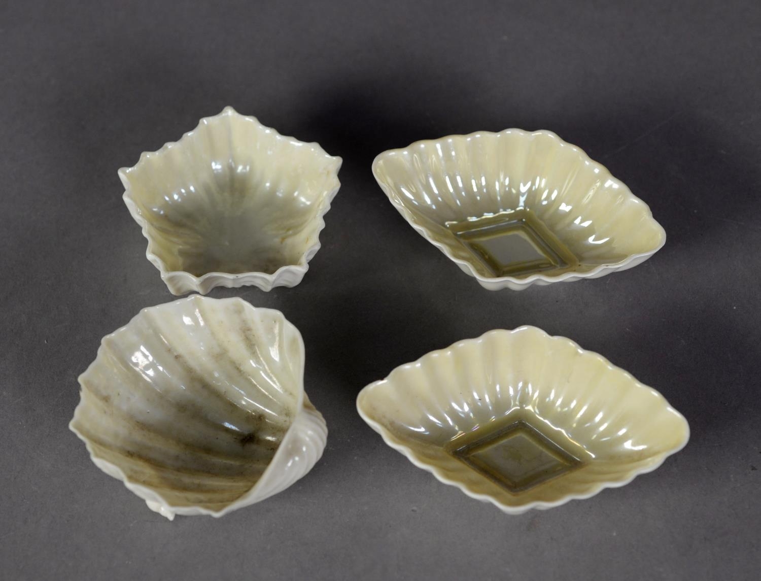 PAIR OF BELLEEK EARLY TWENTIETH CENTURY LOZENGE SHAPE OPEN SALTS, yellow interior, 3 1/2" (9cm)