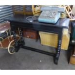 LATE NINETEENTH/ EARLY TWENTIETH CENTRE EBONISED OCCASIONAL OR CENTRE TABLE, WITH MOULDED OBLONG TOP