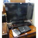 TOSHIBA REZGA FLAT SCREEN TELEVISION WITH REMOTE CONTROL AND THE HUMAX BOX AND REMOTE