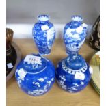 TWO GRADUATED CHINESE PORCELAIN GINGER JARS AND COVERS, IN THE PRUNUS AND CRACKED ICE DECORATION,